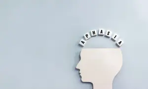 Biały profil głowy z literami tworzącymi słowo "APHASIA" nad nim. Symbolizuje to afazję mieszaną.